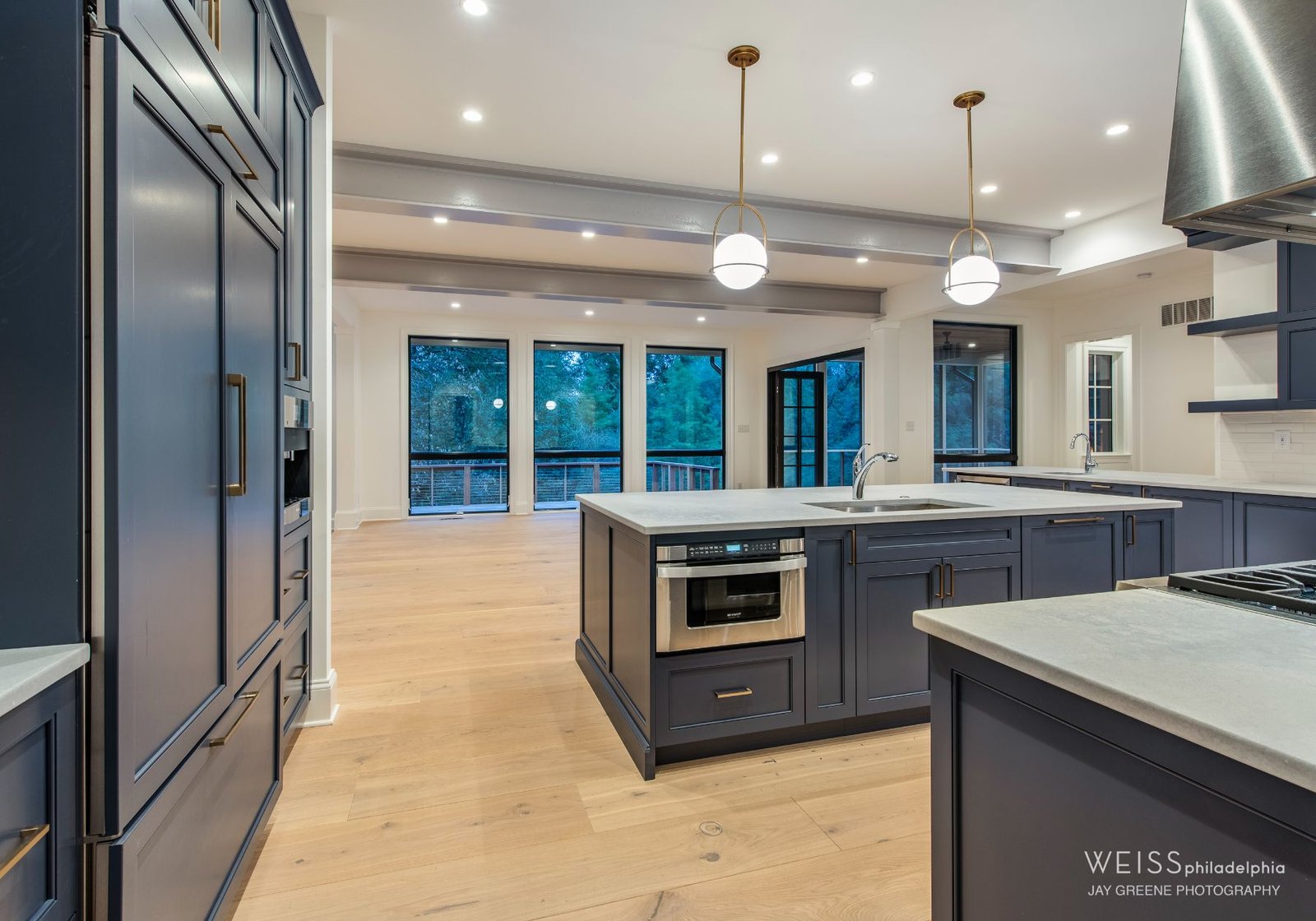 425 - design home studios - custom home builder Wayne pa - blue cabinets - white countertops - globe lighting