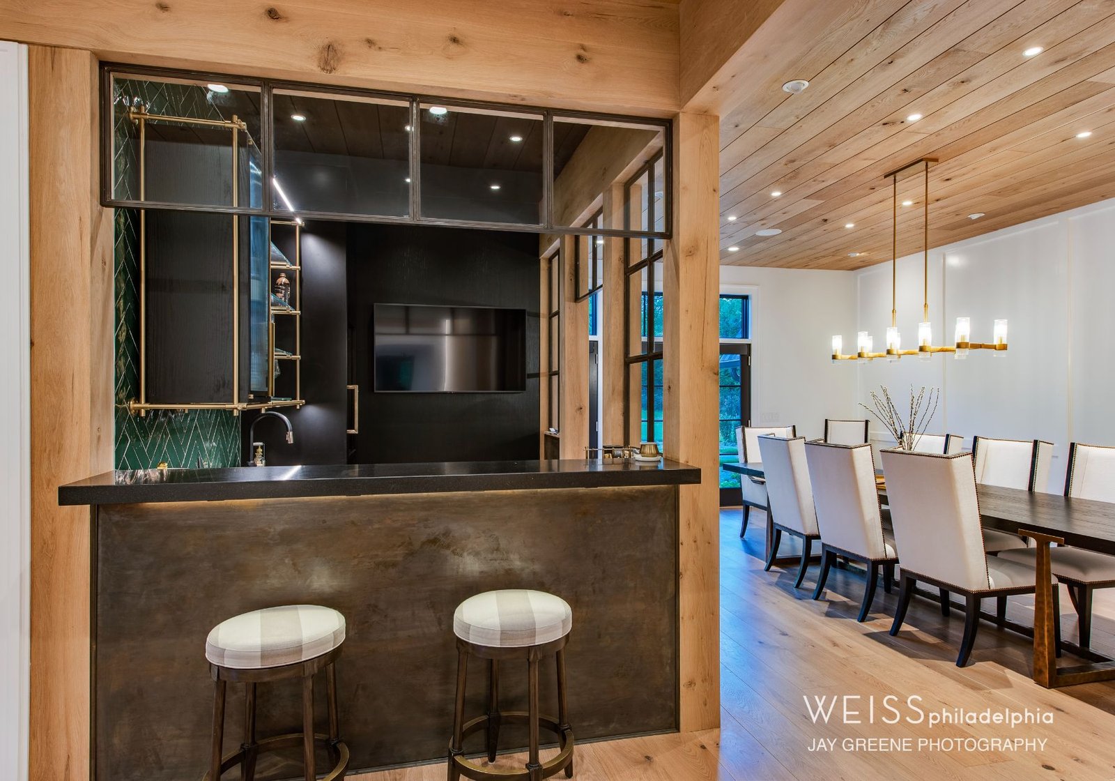 best custom homes wayne pa - design home studios - kitchen wine bar - dining room white chairs - wooden ceiling