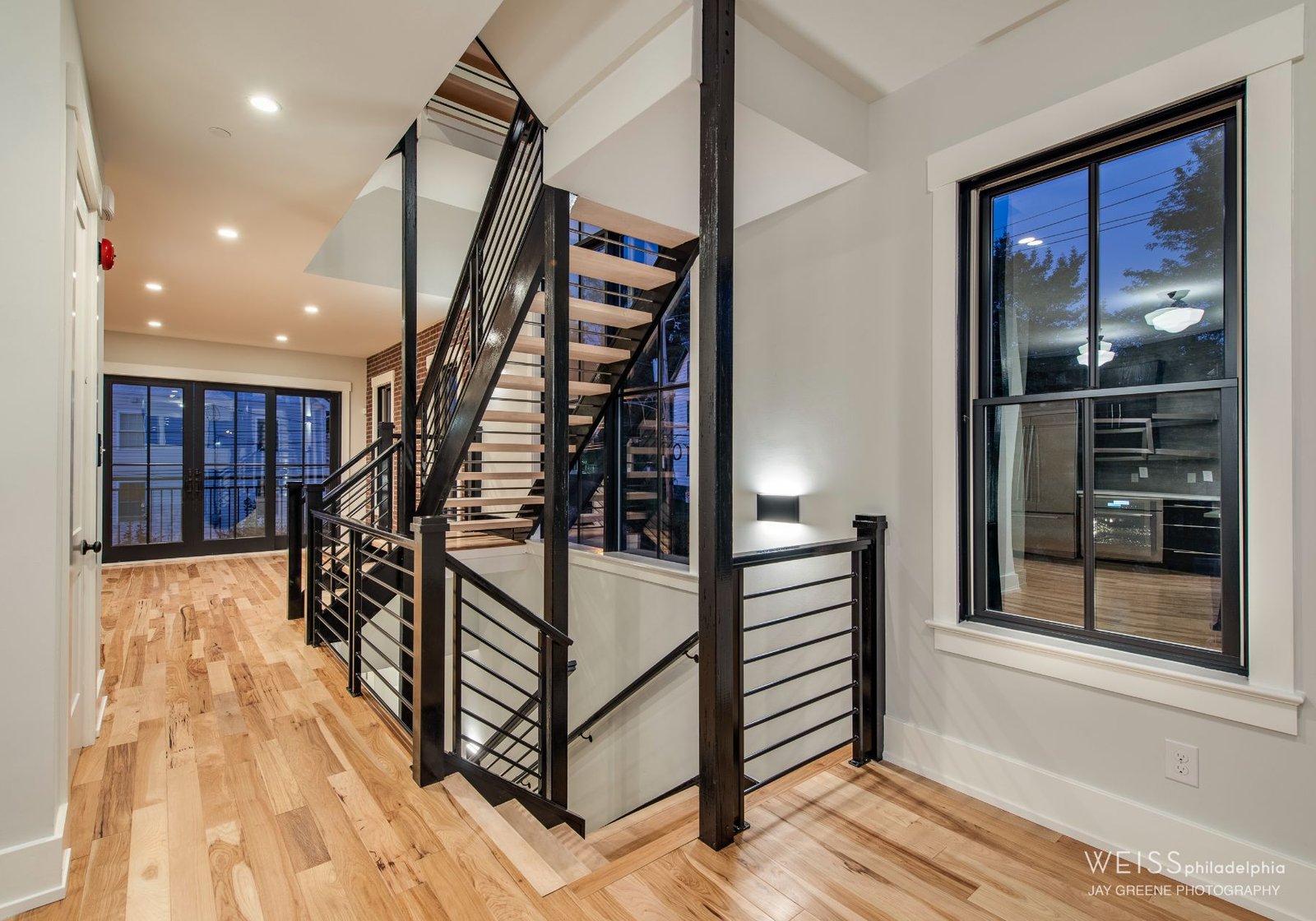 black railing staircase - design home studios - best home builder in Wayne pa
