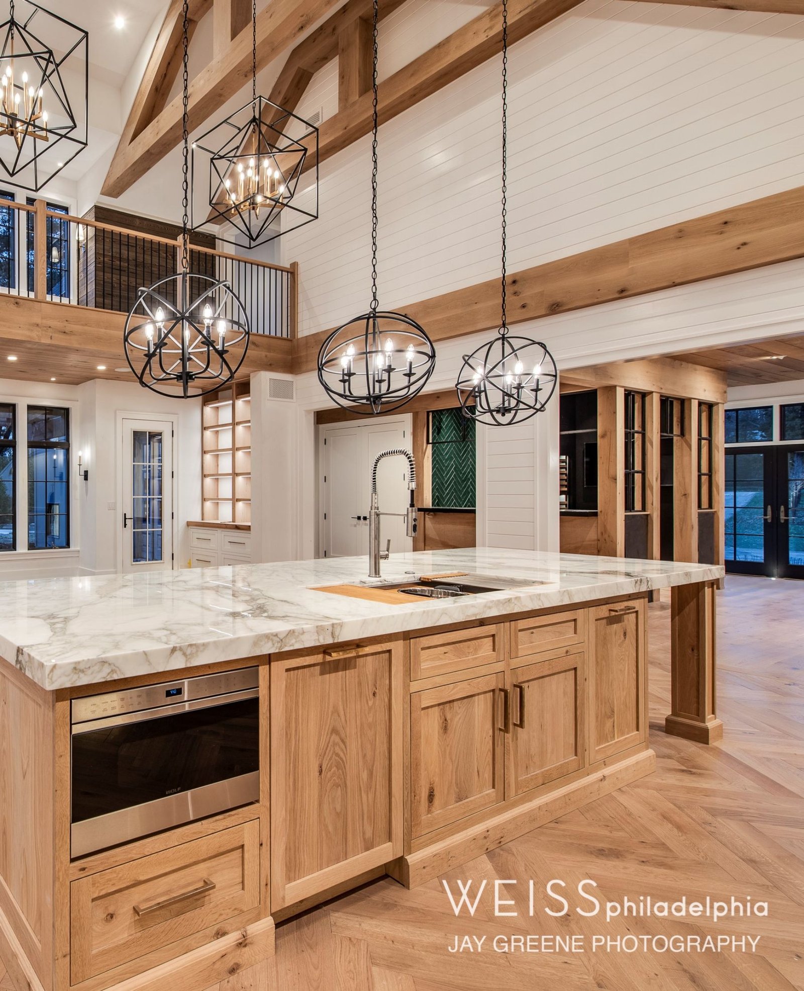 best custom homes wayne pa - design home studios - kitchen - light cabinets white countertops - exposed beams - farmhouse
