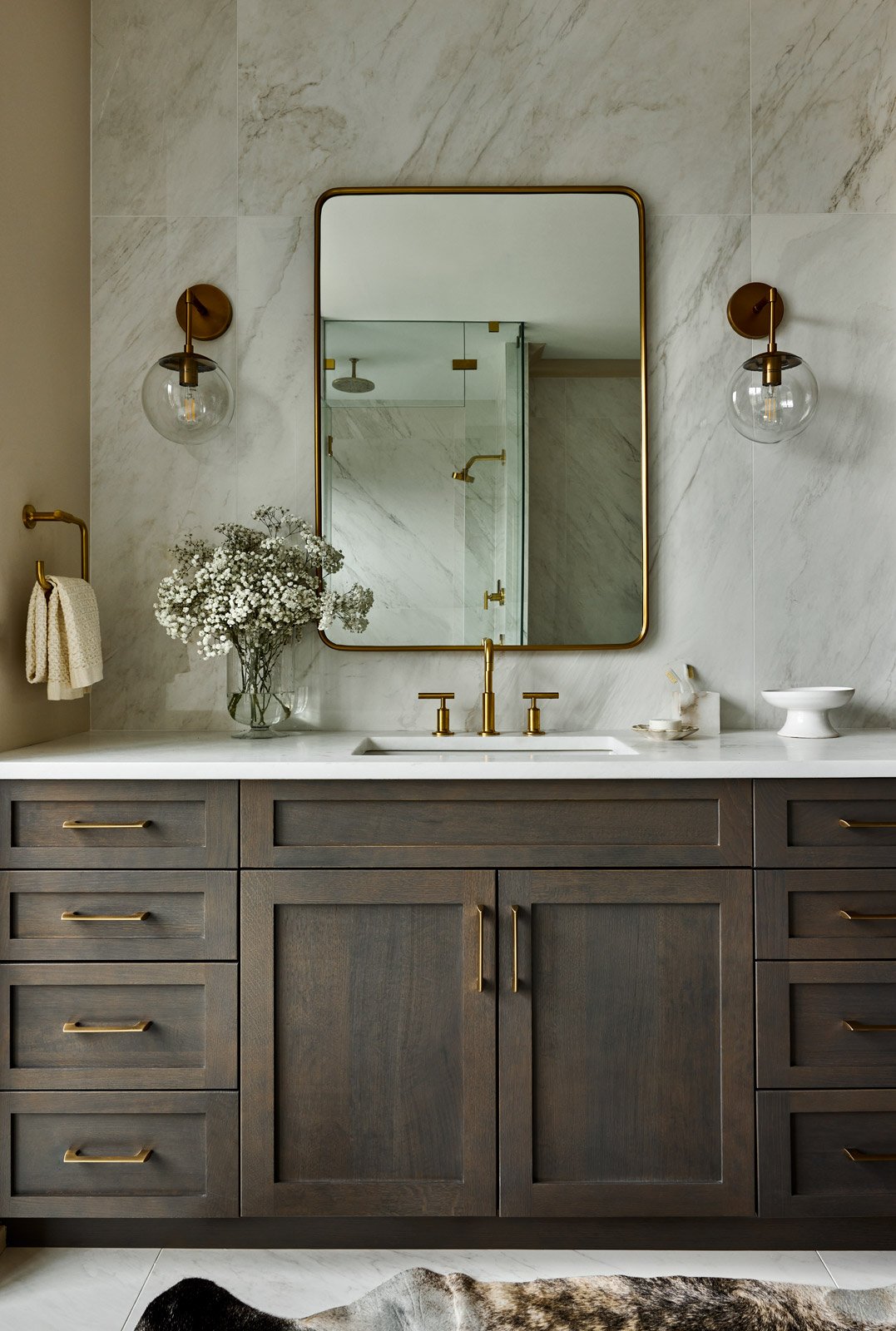 new homes Philadelphia pa - design home studios - custom bathroom - fur rug - dark cabinets - brushed metal hardware - globe lighting - contemporary custom home
