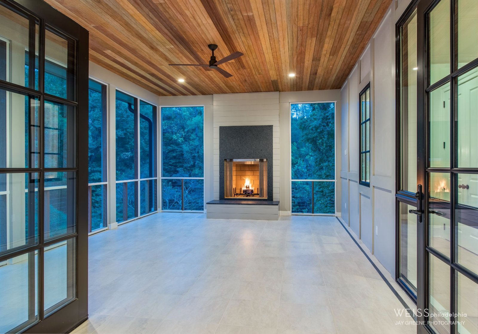 custom home builder Wayne pa - outdoor fireplace - screened in porch - white tile floors
