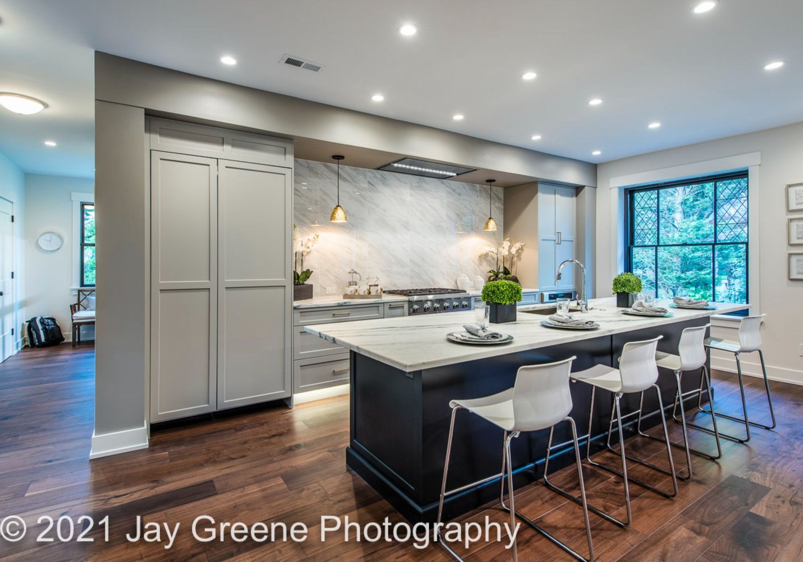 midland road - custom home in Philadelphia pa - custom kitchen and breakfast bar - white chairs - pale grey cabinets